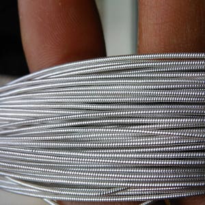 Extra fine matte silver jaseron embroidery thread