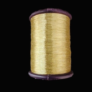 Rocchetto di filo oro chiaro antico