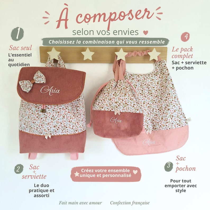 May include: A dusty rose corduroy backpack, a drawstring pouch, and a bib, all featuring a floral print and the name Aria embroidered in white. The items are displayed on a wooden wall hook rack with star-shaped pegs, accompanied by French text.