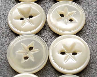 Vintage 1900&#39;s set of eight small mother of pearl shirt buttons.