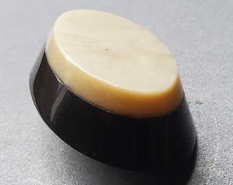Vintage very large Art Deco 1920's plastic coat buttons.