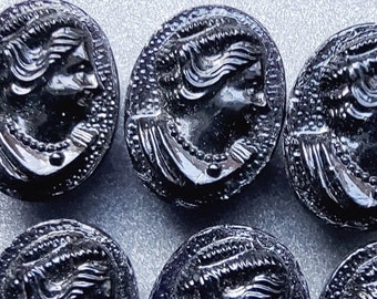 Vintage set of six Black glass oval shaped cameo buttons.