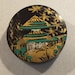 Vintage oriental hand painted laquered button.