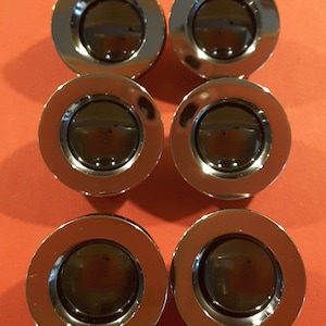 Vintage 1950&#39;s designer metal buttons (2 sizes.)