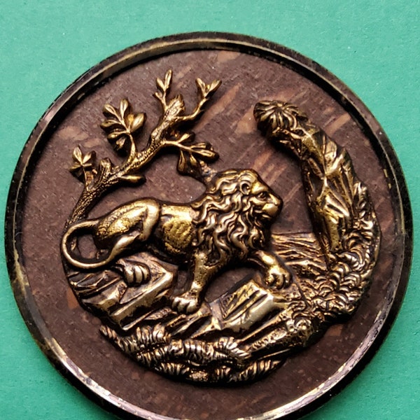 Large late 1800's metal and wood lion button.