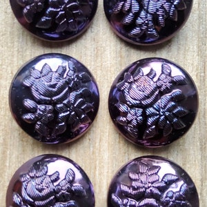Purple metallic Czech glass buttons.