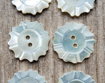 Vintage set of six engraved natural mother of pearl buttons.