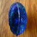 Czechoslovakian iridescent glass leaf button.