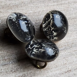 Vintage early 1900's set of three glass paperweight buttons. image 2