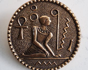 Vintage 1950's large alloy Egyptian themed coat button.