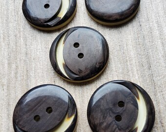 Vintage 1920-30's set of five early plastic buttons.