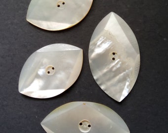 Vintage set of four Art Deco mother of pearl buttons.