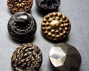 Vintage 1920-30's collection of six gold and silver glass buttons.