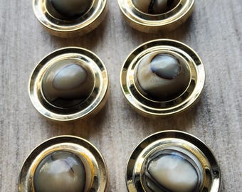 Vintage set of six 1960's metalized plastic buttons.