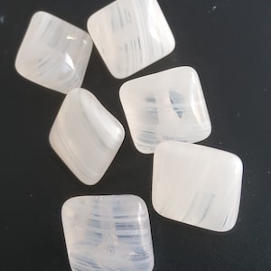 Vintage set of six square opaque white glass buttons.