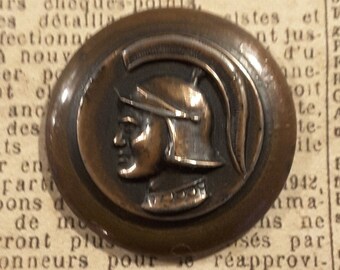 Botón de centurión romano de metal vintage.