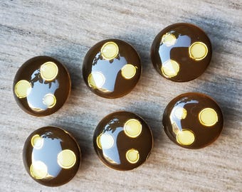 Vintage set of six enamel haute couture buttons.