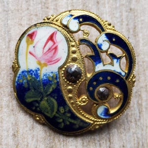 Vintage 1900's hand painted enamel button.