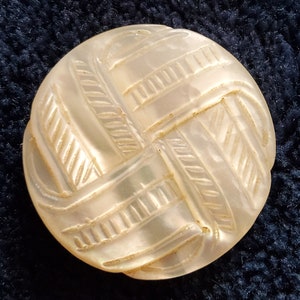 Vintage  large late 19th Century mother of pearl button.