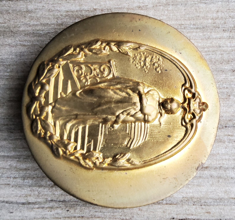 Large brass stamped button of Queen Louise. image 8