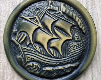 Vintage large 1930's Galleon celluloid coat button.