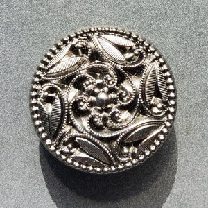 Vintage intricate Czech glass button.