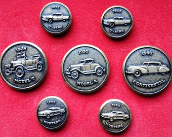 Vintage very nice box set of metal automobile blazer buttons.
