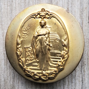 Large brass stamped button of Queen Louise. image 1