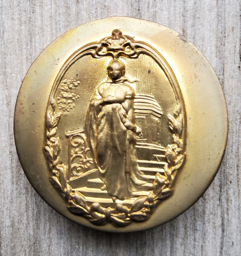 Large brass stamped button of Queen Louise. image 1