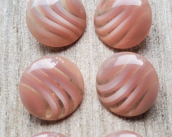 Vintage set of six pink acrylic buttons.