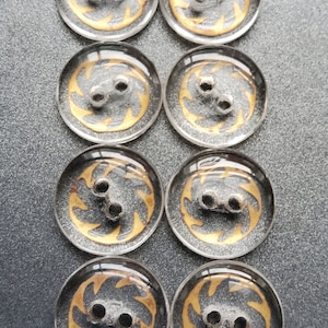 Vintage set of eight 1920&#39;s clear glass buttons.
