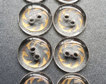 Vintage set of eight 1920's clear glass buttons.