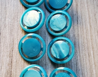 Vintage set of eight large 1950's turquoise coat buttons.