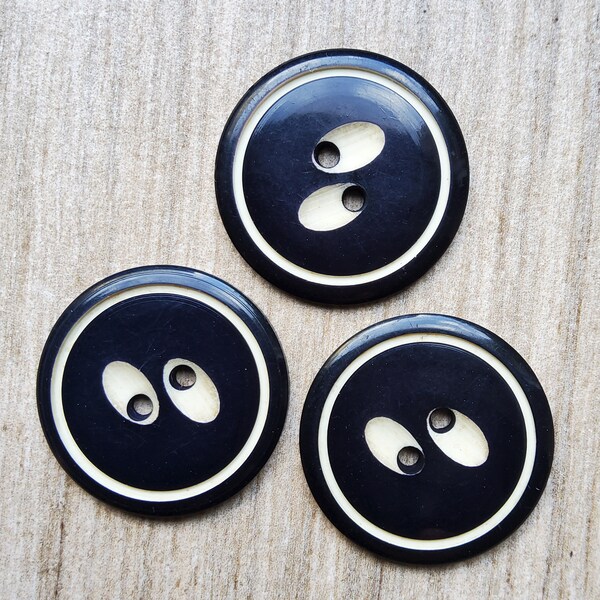 Vintage large trio of Art Deco plastic buttons.