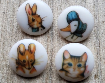 Vintage 1976 set of four Beatrix Potter buttons.