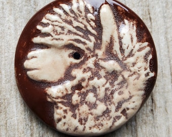 Vintage large hand made ceramic alpaca button.