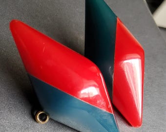 Vintage large pair of 1920's plastic toggle coat buttons.