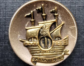 Vintage large Santa's Maria button.