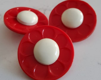 Vintage set of three large 1930's red and white coat buttons.