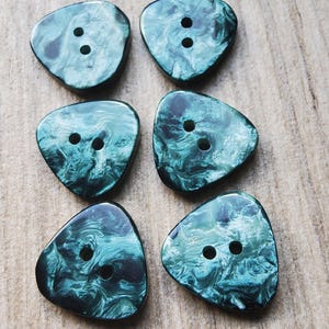 Vintage set of six marbled green plastic jacket buttons.