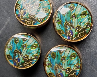 Haute couture set of four enamel jacket buttons.