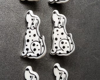 Set of six childrens dalmatian dog plastic buttons.