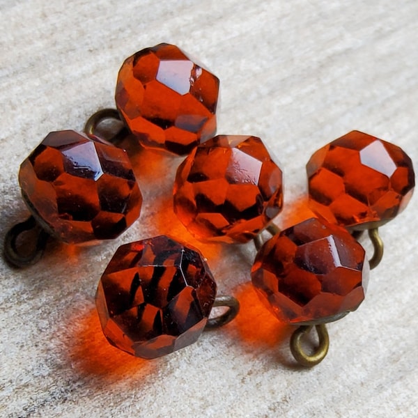 Ensemble victorien vintage de six boutons boule en verre taillé orange brûlé.