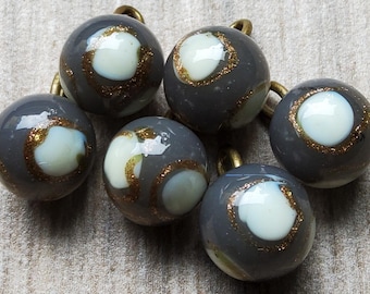Vintage 1900's set of six grey, white and gold glass ball buttons.
