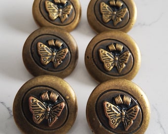 Vintage set of six small metalized butterfly buttons.