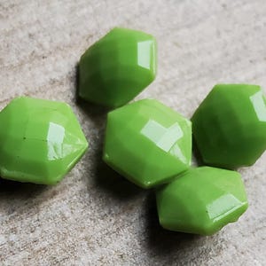 Vintage set of five small 1920's green glass buttons.