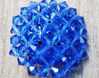 Vintage very large and very unusual blue glass button.