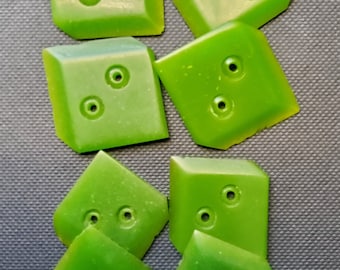 Vintage 1920-30's set of eight green plastic buttons.