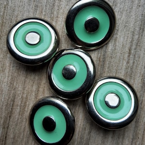 Vintage set of five peppermint green and silver metal enamel buttons.