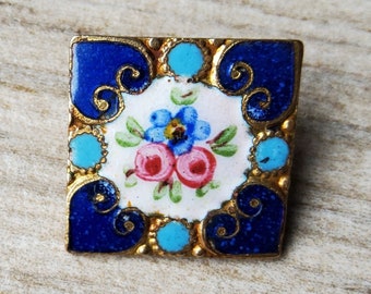 Early 1900's French hand painted enamel button.